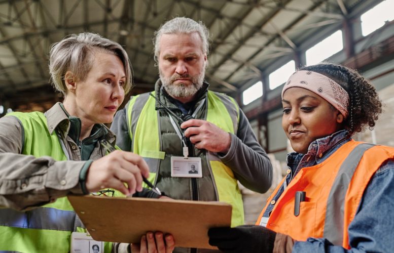 foreman-discussing-invoice-with-workers-2025-02-11-15-30-25-utc (Large)